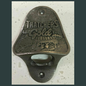 ANTIQUE THATCHERS GOLD CAST IRON BAR WALL MOUNTED BOTTLE OPENER