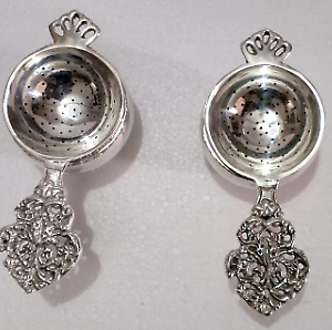 Pair of Victorian Style silver plated tea strainers