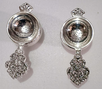 Pair of Victorian Style silver plated tea strainers