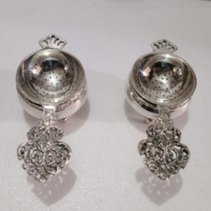 Pair of Victorian Style silver plated tea strainers